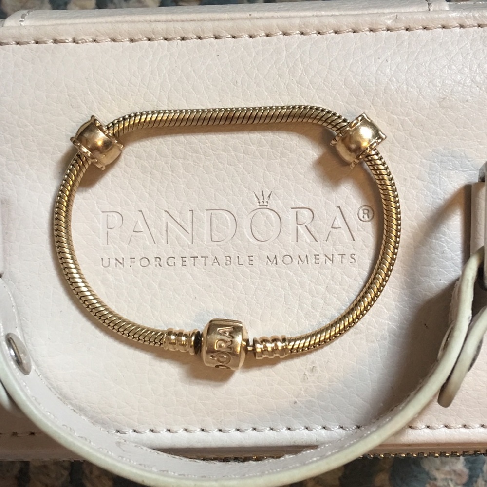 Pandora 14k gold bracelet w/ 2 clips